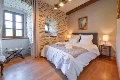 Un ou plusieurs lits dans un hébergement de l'établissement Gîte de Prestige dans un Fort, Jacuzzi, 8 pers