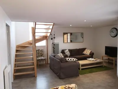 Coin salon dans l'établissement Gites et camping le Sédour