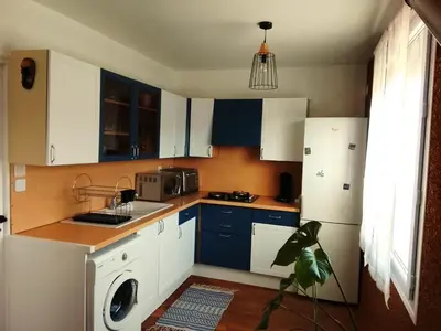 Cuisine ou kitchenette dans l'établissement Grand Duplex, proche de la Dordogne