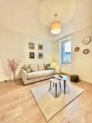 Coin salon dans l'établissement Beau T2 Cocooning rue de Rochechouart - DABNB