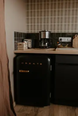 Cuisine ou kitchenette dans l'établissement Aux Choses Simples
