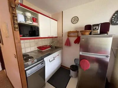 Cuisine ou kitchenette dans l'établissement Appartement 2 pièces Griou 52