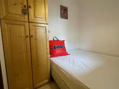 Un ou plusieurs lits dans un hébergement de l'établissement Appartement GRIOU 30