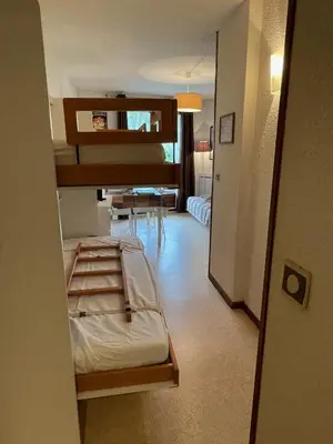 Un ou plusieurs lits dans un hébergement de l'établissement Appartement GRIOU 30