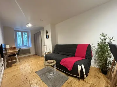 Coin salon dans l'établissement Le Petit Carmes, intimiste et central
