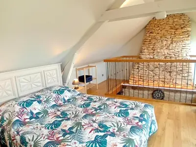 Un ou plusieurs lits dans un hébergement de l'établissement Maison cosy pour couple avec spa privé en Périgord - FR-1-616-507