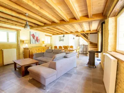 Coin salon dans l'établissement Maison climatisée avec piscine privée et animaux admis - FR-1-616-515