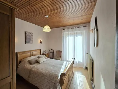 Un ou plusieurs lits dans un hébergement de l'établissement Maison de campagne confortable en Dordogne - FR-1-616-521