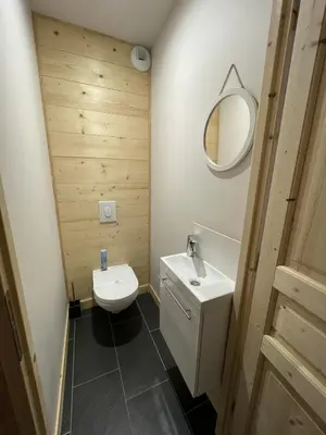 Salle de bains dans l'établissement Chalet AIGUILLON RDC D
