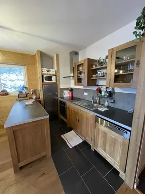 Cuisine ou kitchenette dans l'établissement Chalet AIGUILLON RDC D