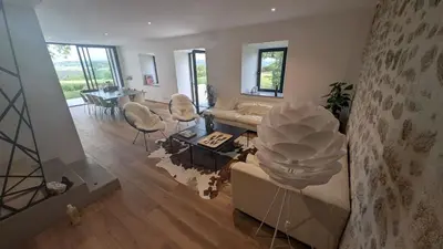 Coin salon dans l'établissement Maison d'exception au Longeard
