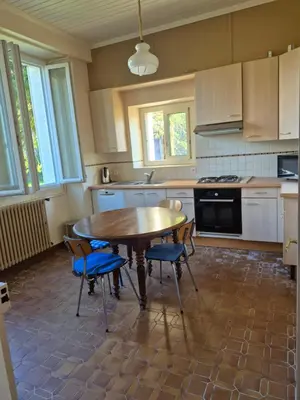 Cuisine ou kitchenette dans l'établissement Au Moulin de Gary