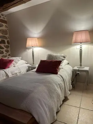 Un ou plusieurs lits dans un hébergement de l'établissement Au coeur des lacs Calme absolu et confort moderne