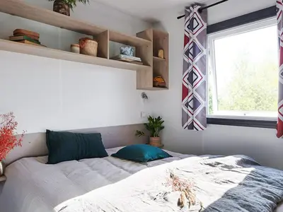 Un ou plusieurs lits dans un hébergement de l'établissement Mobil home pour 6 personnes avec terrasse - API-1-52-1310