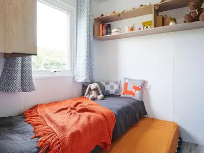 Un ou plusieurs lits dans un hébergement de l'établissement Mobil home pour 6 personnes avec terrasse - API-1-52-1310