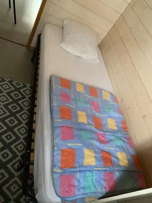 Un ou plusieurs lits dans un hébergement de l'établissement Chalet climatisé avec piscine, lac à proximité
