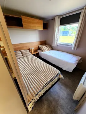 Un ou plusieurs lits dans un hébergement de l'établissement MOBIL-HOME JASMIN 04 à 06 places