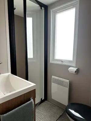 Un ou plusieurs lits dans un hébergement de l'établissement MOBIL-HOME VIOLETTE 6-8 Places