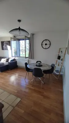 Coin salon dans l'établissement Maison individuelle avec terrain arboré