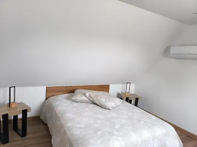 Un ou plusieurs lits dans un hébergement de l'établissement Maison de campagne