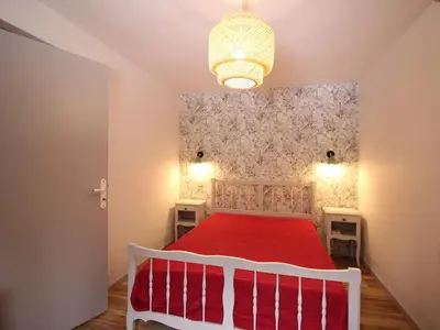 Un ou plusieurs lits dans un hébergement de l'établissement Bel appartement F2 bis avec balcon et parking, Mont-Dore - FR-1-415-213