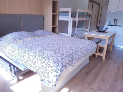 Un ou plusieurs lits dans un hébergement de l'établissement Appartement au pied des pistes