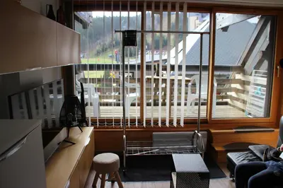 Coin salon dans l'établissement Appartement au pied des pistes