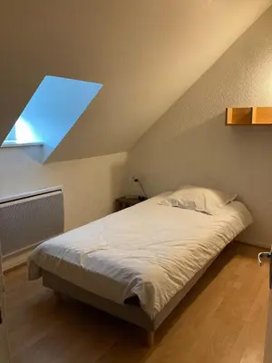 Un ou plusieurs lits dans un hébergement de l'établissement Country house! Maison de campagne!