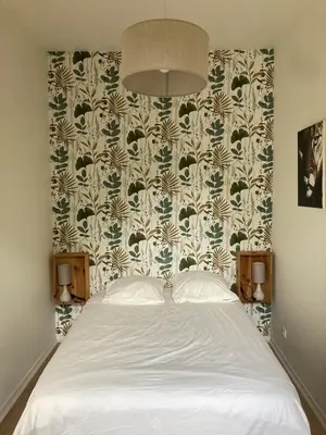 Un ou plusieurs lits dans un hébergement de l'établissement Country house! Maison de campagne!