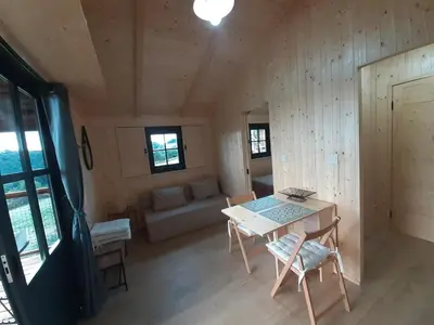 Coin salon dans l'établissement cabane ardoisiere