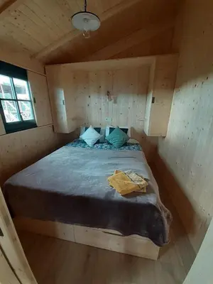 Un ou plusieurs lits dans un hébergement de l'établissement cabane ardoisiere