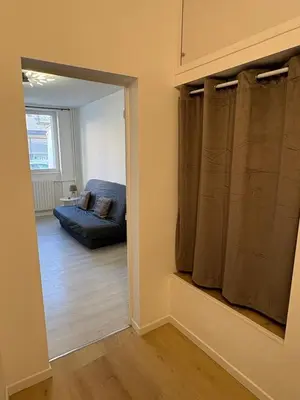 Coin salon dans l'établissement Appartement du Souvenir BIS Confort et Centre ville