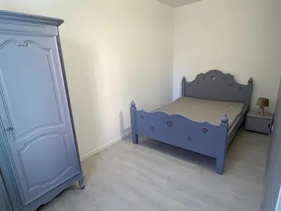 Un ou plusieurs lits dans un hébergement de l'établissement Appartement du Souvenirs Confort et Centre ville