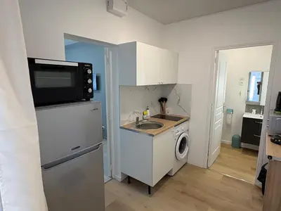 Cuisine ou kitchenette dans l'établissement Appartement du Souvenirs Confort et Centre ville