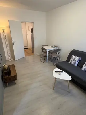 Coin salon dans l'établissement Appartement du Souvenirs Confort et Centre ville