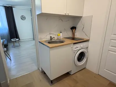 Cuisine ou kitchenette dans l'établissement Appartement du Souvenirs Confort et Centre ville