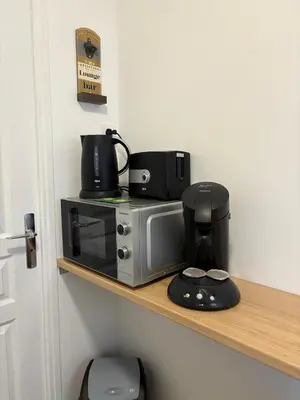 Cuisine ou kitchenette dans l'établissement Appartement du Souvenirs Confort et Centre ville