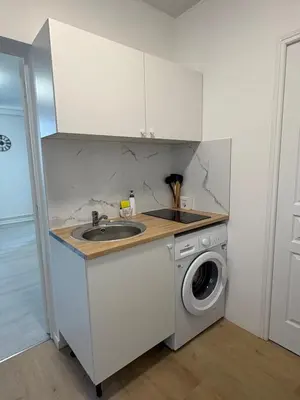 Cuisine ou kitchenette dans l'établissement Appartement du Souvenirs Confort et Centre ville