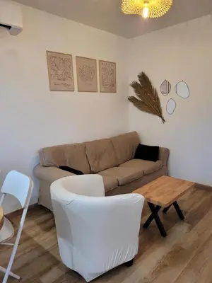 Coin salon dans l'établissement La Terrasse Gîte