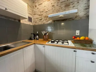 Cuisine ou kitchenette dans l'établissement Domaine Voilà