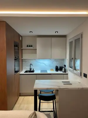 Cuisine ou kitchenette dans l'établissement Le 34 Urban luxury Cinema et Terrasse - Centre Gare - Accès autonome