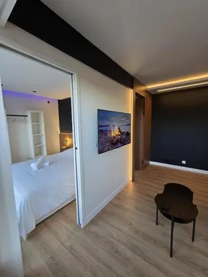 Un ou plusieurs lits dans un hébergement de l'établissement Le 34 Urban luxury Cinema et Terrasse - Centre Gare - Accès autonome
