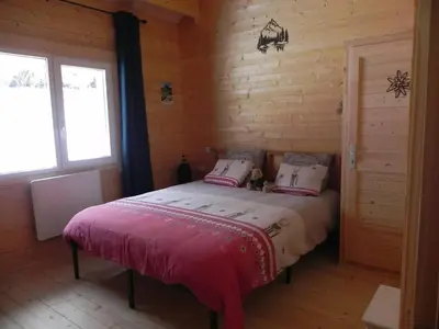 Un ou plusieurs lits dans un hébergement de l'établissement Chalet avec Vue à Murat-le-Quaire - 120 m²
