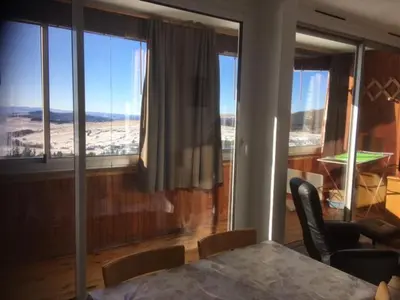 Coin salon dans l'établissement Appartement 4 personnes Super Besse