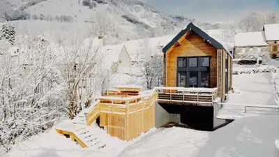 L'établissement chalet contemporain la tribù le Lioran en hiver