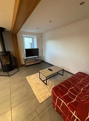 Un ou plusieurs lits dans un hébergement de l'établissement Gîte à la campagne Le Pissenlit