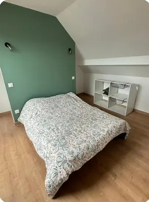 Un ou plusieurs lits dans un hébergement de l'établissement Gîte à la campagne Le Pissenlit