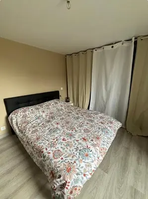 Un ou plusieurs lits dans un hébergement de l'établissement Gîte à la campagne Le Pissenlit