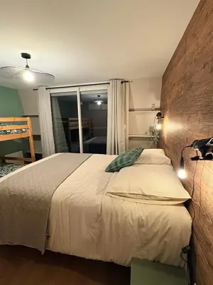 Un ou plusieurs lits dans un hébergement de l'établissement Lioran - Appartement 3 chambre, 8 personnes
