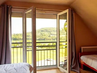 Un ou plusieurs lits dans un hébergement de l'établissement Gîte avec Terrasse pour 5 personnes à Lissac-sur-Couze - API-1-52-1013